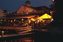 View of Outside Deck and Tiki Bar at night.
